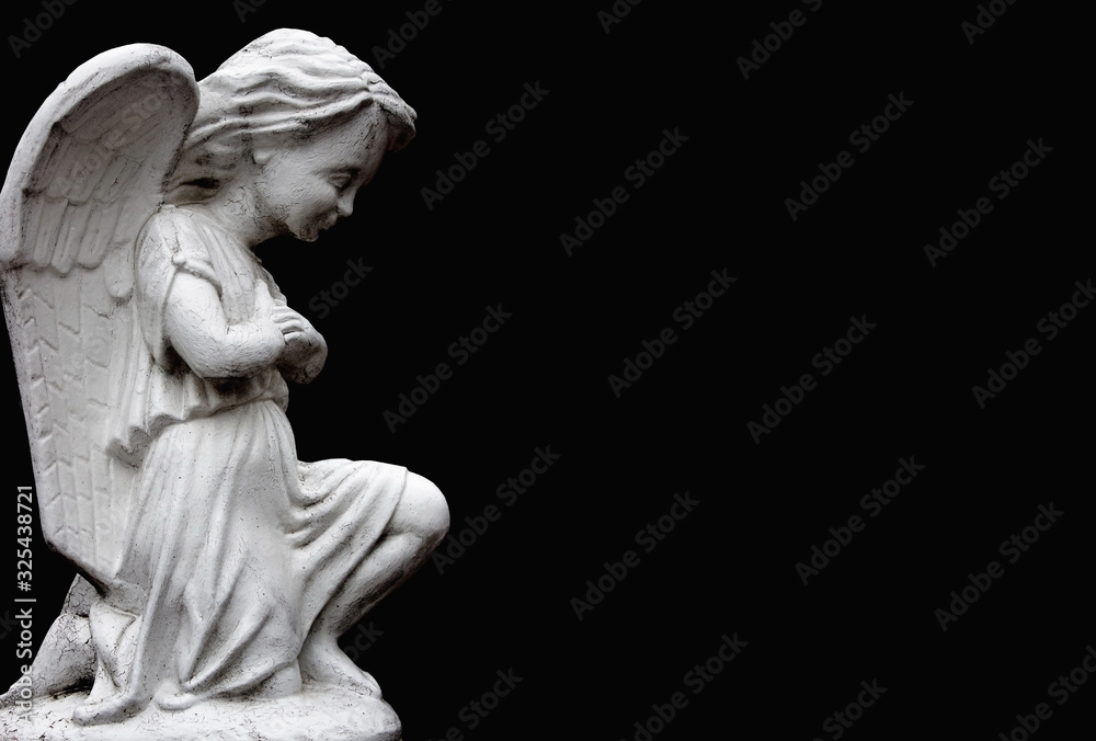 Little angel on black background. Annunciation and suffering