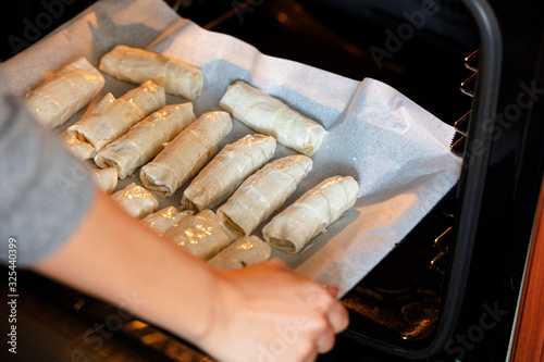 pastry preparation, cheese and potato baguette fritters. photo