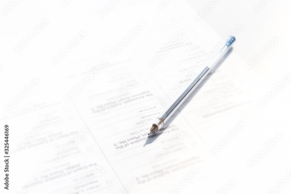 Voting in the Duma elections, president, laws.The pen rests on the ballot paper Voting in the Duma elections, president, laws.The pen rests on the ballot paper