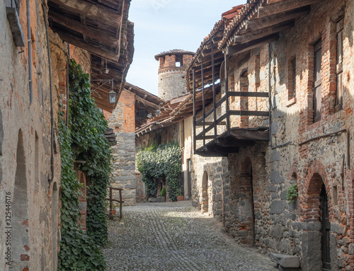 Fototapeta Naklejka Na Ścianę i Meble -  Ricetto di Candelo, old cobblestone street of the fortified medieval village. Piedmont - Italy