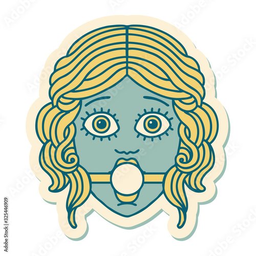 tattoo style sticker of female face with ball gag
