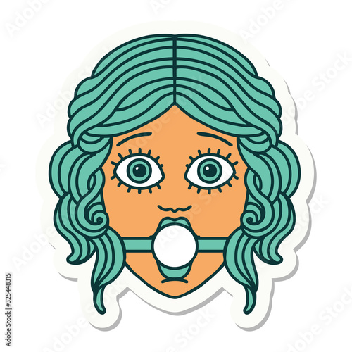 tattoo style sticker of female face with ball gag