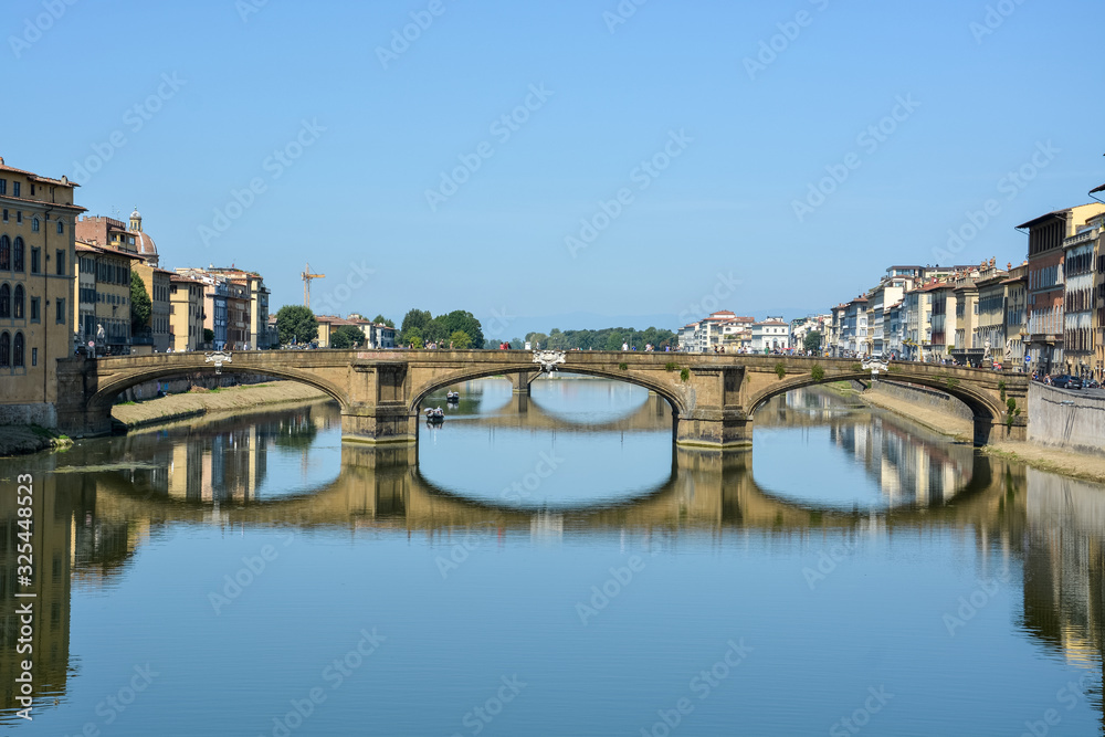 Bridge over the river Arno in Florence on a sunny day