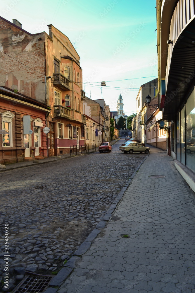 Obraz premium old street with a cobblestone pavement, Uzhhorod, Ukraine