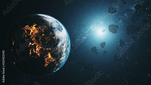 Fototapeta Naklejka Na Ścianę i Meble -  black asteroids fly by illuminated realistic planet Earth at blue star light in outer space. 3d animation. Science and technology concept. Elements of this product furnished by NASA