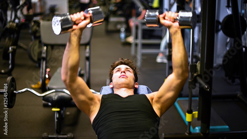 Man training his chest in the gym