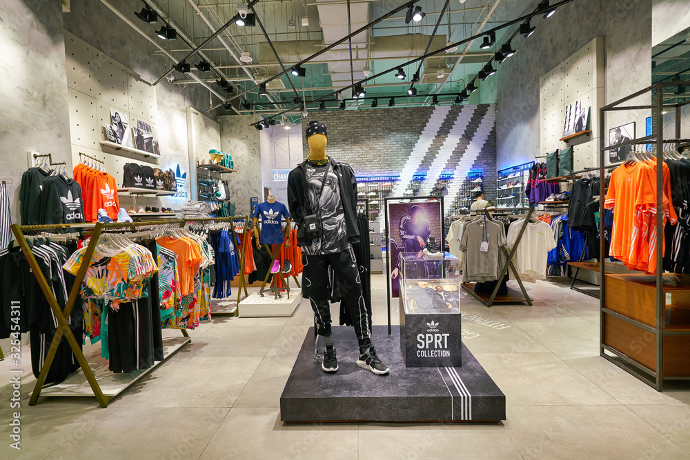 SINGAPORE - APRIL 03, 2019: interior shot of Adidas store at a shopping  mall in Singapore. Stock Photo | Adobe Stock