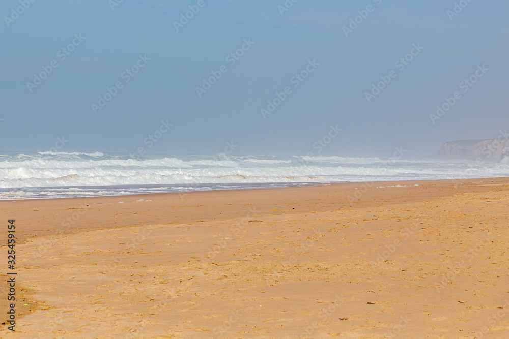 Ocean coast, moviment waves with foam. Wind power. Turquoise water. Ocean coast, moviment waves with foam. Wind power. Turquoise water.