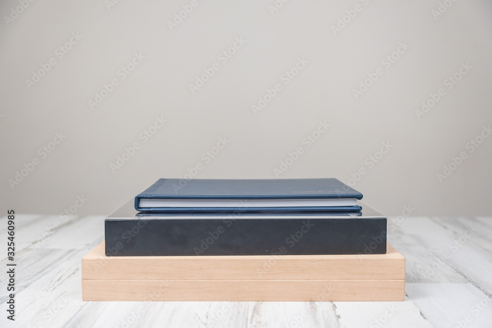 Stack of 3 books on isolated white blurred background with copy space for text Stack of 3 books on isolated white blurred background with copy space for text