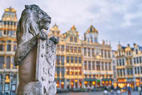 Lion Statue at the Grand Place in Brussels, Belgium at dusk photo