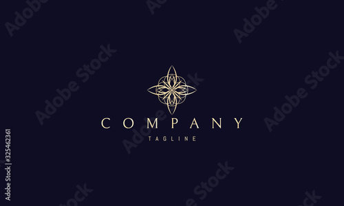 Vector golden logo on which an abstract image of the cross.
