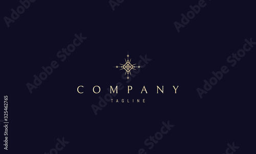 Vector golden logo on which an abstract image of a cross that also looks like a star.