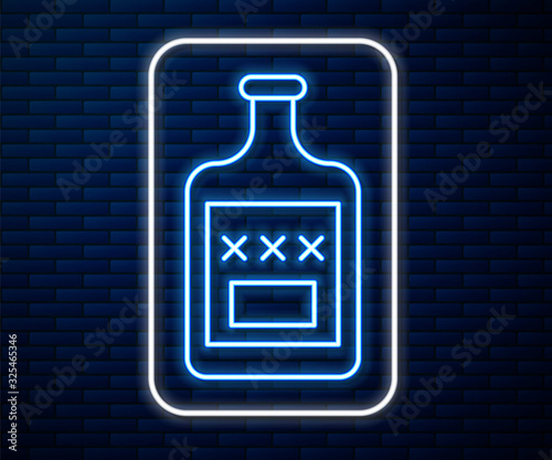 Glowing neon line Whiskey bottle icon isolated on brick wall background.  Vector Illustration