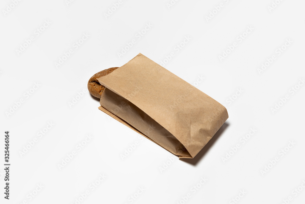 Fresh Black Bread in a brown kraft Paper Bag Mockup on white background ...