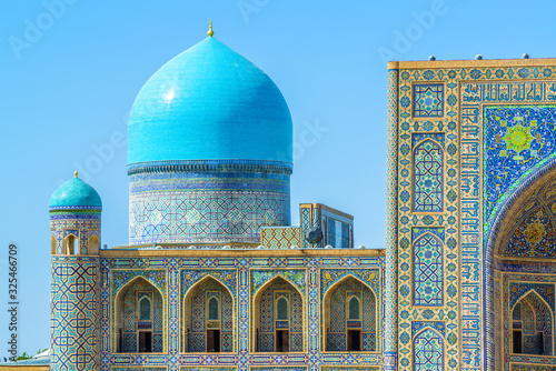 Tilya-Kori Madrasah, a part of Registan medieval architectural ensemble, Samarkand, Uzbekistan photo