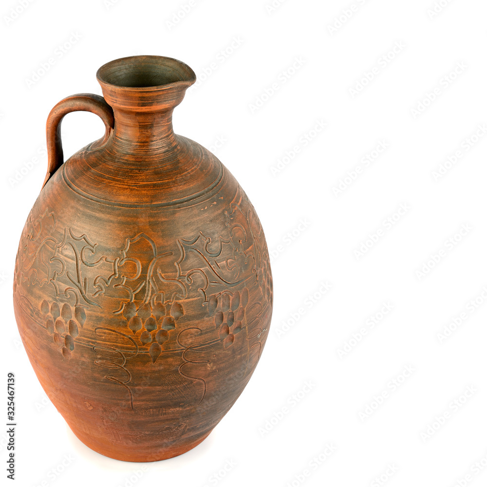 Clay jug Isolated on a white background. There is free space for your text.