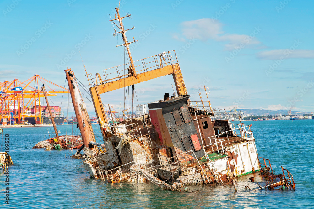 Panaroma view of Mersin and Shipwreck, Sunken ship near international sea port of Mersin. Turkey Panaroma view of Mersin and Shipwreck, Sunken ship near international sea port of Mersin. Turkey