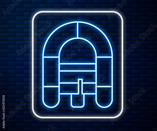 Glowing neon line Rafting boat icon isolated on brick wall background. Inflatable boat. Water sports, extreme sports, holiday, vacation.  Vector Illustration