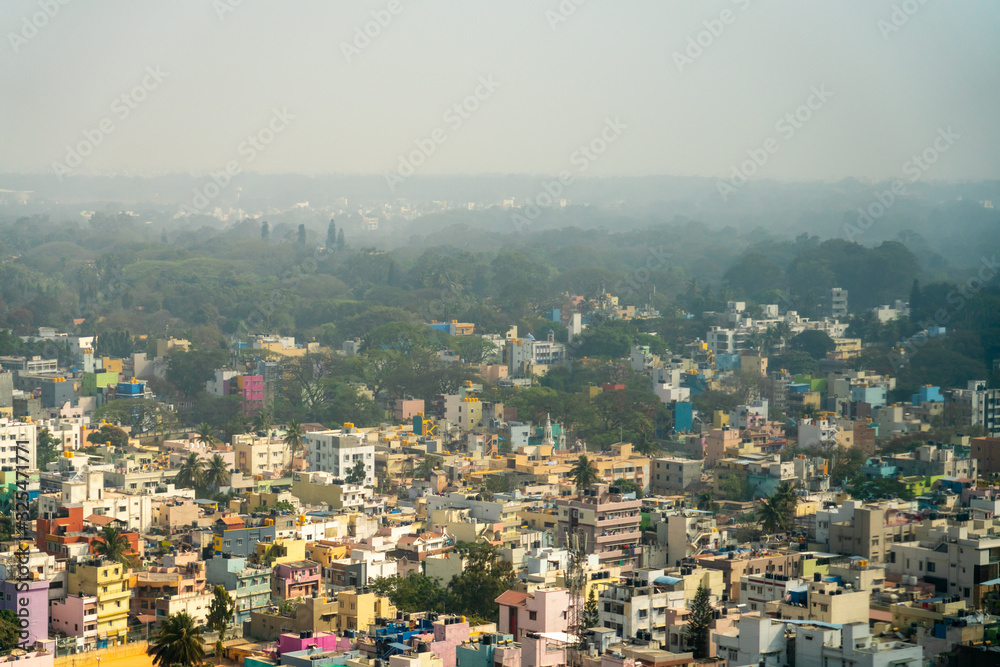 View of Fog In the Early Morning Over Colorful Bangalore Neighborhood in India