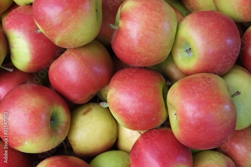High angle shot of delicious fresh apples in the market photo