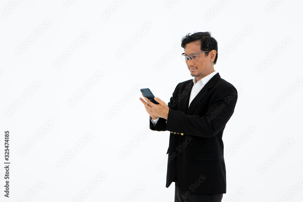 the asian business man lawyer standing and talking on mobile cellular Phone wearing formal suit isolated on white background with copy space 