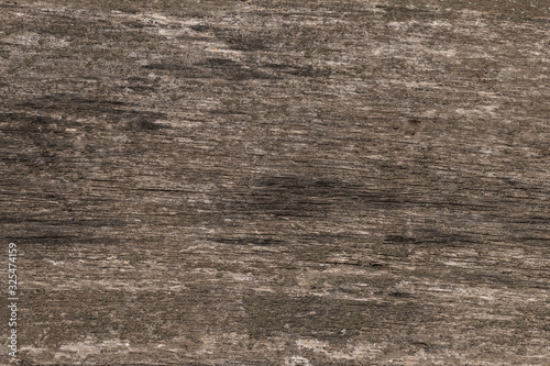 close up of dark gray wooden board background