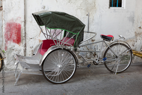 Traditional street bike car in Malaysia.