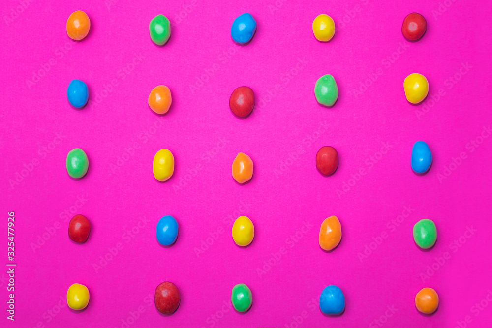 colored sweets lie in rows colored sweets lie in rows