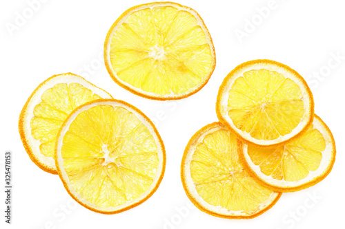 dried slices of orange isolated on a white background. top view
