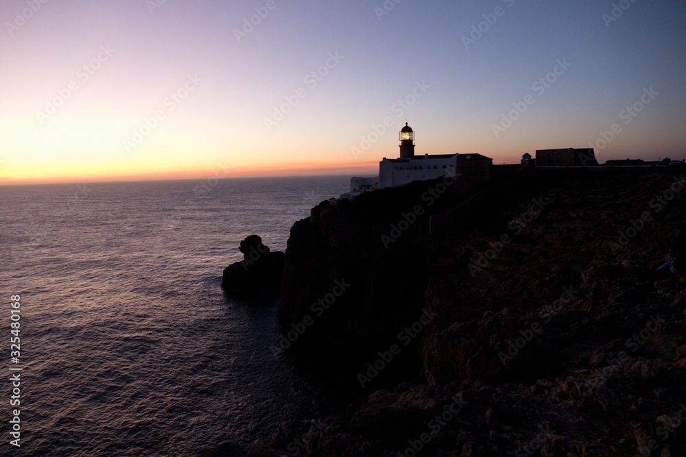 sunset at cabo de sao vicente in portugal