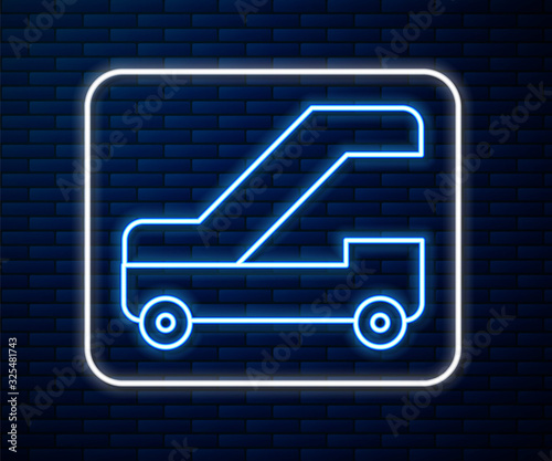 Glowing neon line Passenger ladder for plane boarding icon isolated on brick wall background. Airport stair travel. Vector Illustration