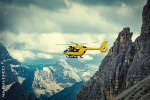 Panoramic flight over the mountains. Air transport.