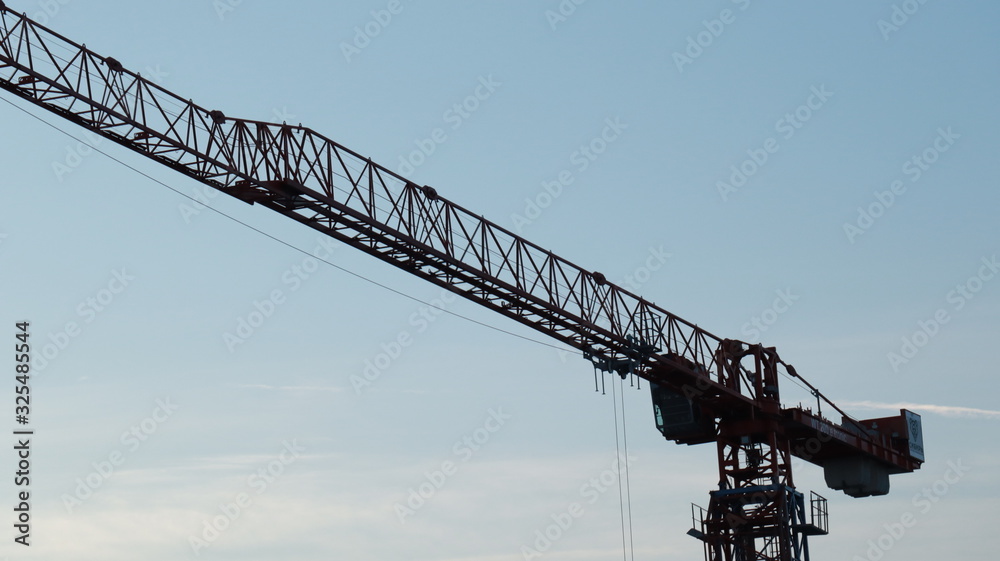 crane on background of blue sky