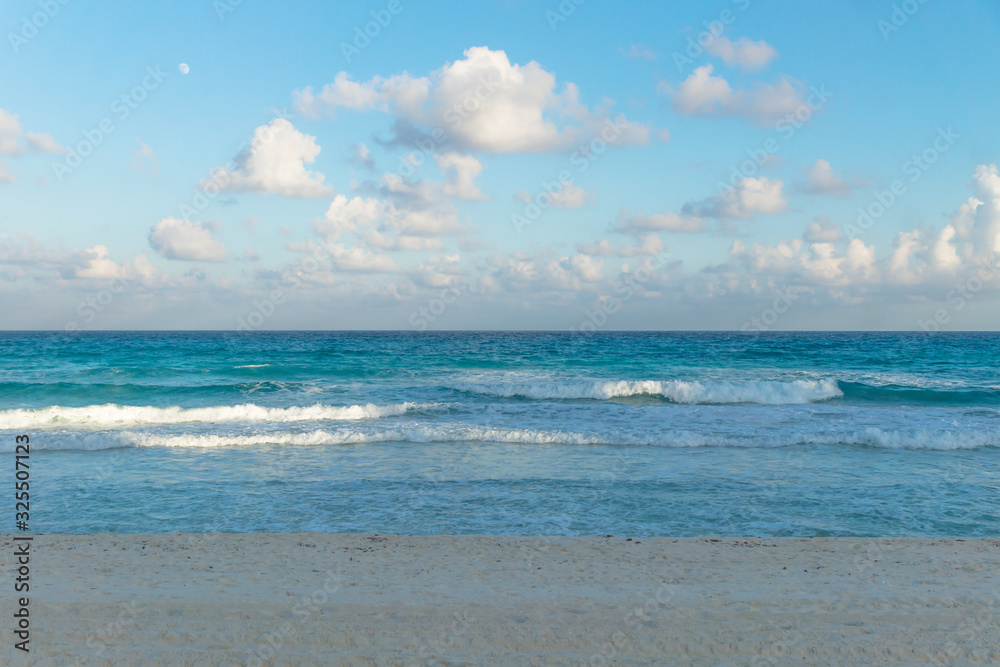 Ocean waves during sunset at Cancun, Yucatan, Mexico