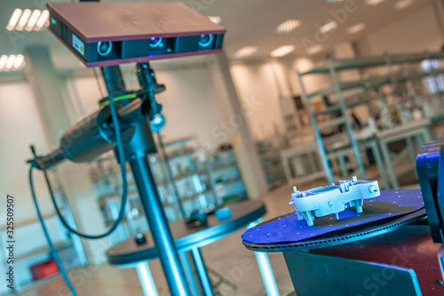 technically professional machine for 3D scanning and measurement of plastic moldings using a laser photo
