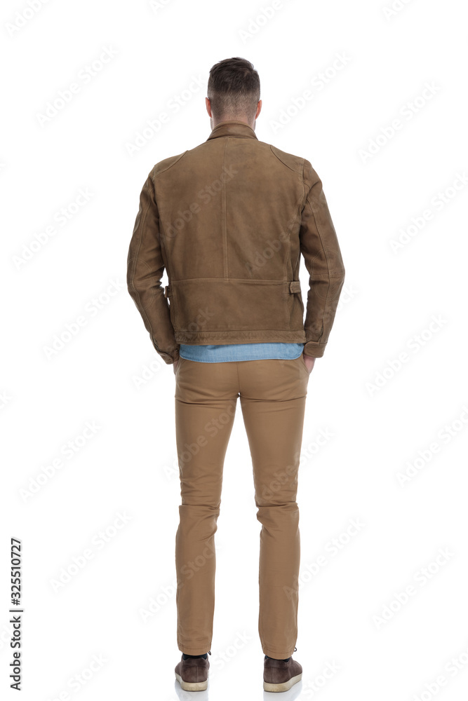 Rear view of confident casual man standing Rear view of confident casual man standing