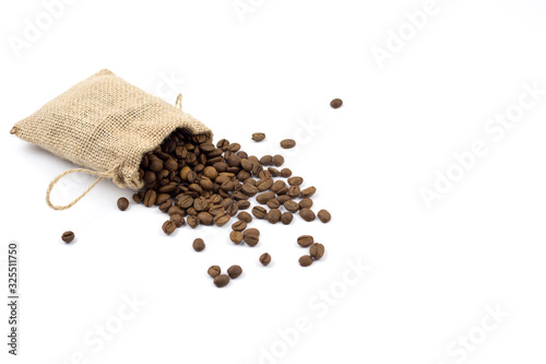 Coffee beans in canvas sack on white background.