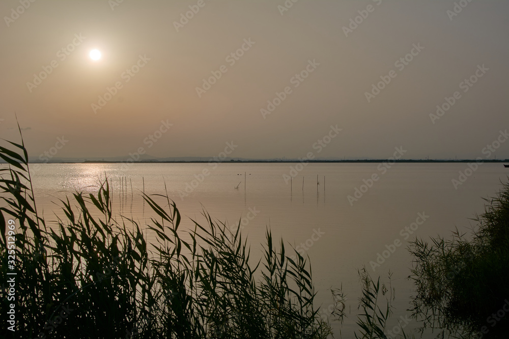 Reflections of the sunset in the lagoon