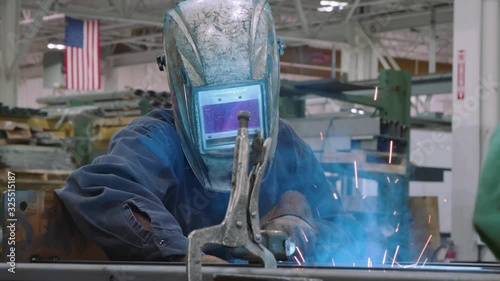 Patriotic Factory Engineer Operating Welding Machine For Product That is  Made In America