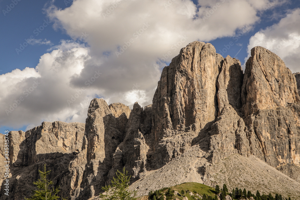 Morning panorama of Gardena mountain pass or Passo Gardena. Looking east towards the mountains in a sunny weather. Morning panorama of Gardena mountain pass or Passo Gardena. Looking east towards the mountains in a sunny weather.