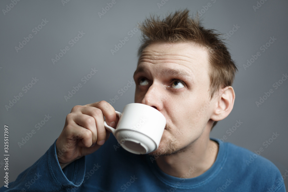 Handsome man with a cup of coffee Handsome man with a cup of coffee