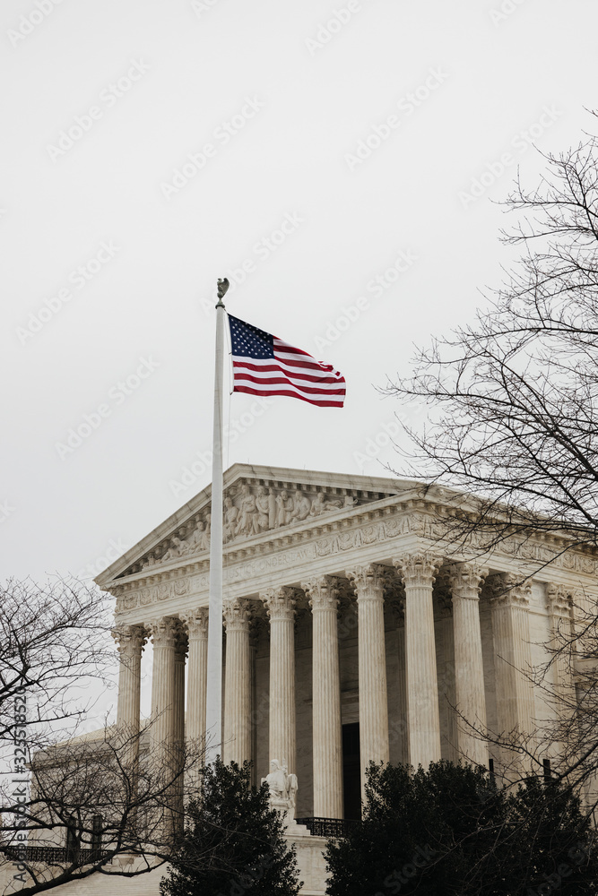 Supreme court of the United States and American flag
