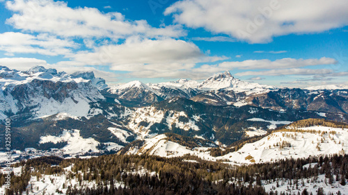 Aerial Panorama view over the alps at south Tirol, Tirol, Italy, Europe. Skiing with drone in the alps. Snow covered mountains. A valley in the Italian alps during winter time. Highest mountain.