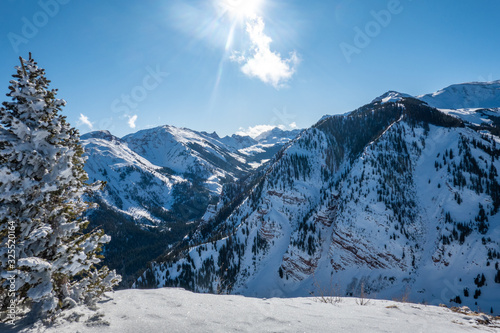 Panoramic view of the Rocky Mountains of Colorado, looking up from the top of Elk Camp chairlift at the Aspen Snowmass ski resort.