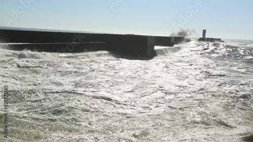 Ocean surf on the city's waterfront. Porto, Portugal.
