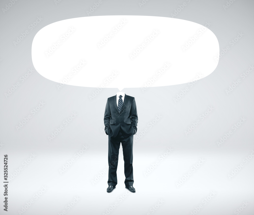 Businessman in suit with empty speech bubbles