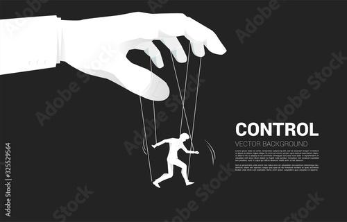Stampa su tela Puppet Master controlling Silhouette of businessman
