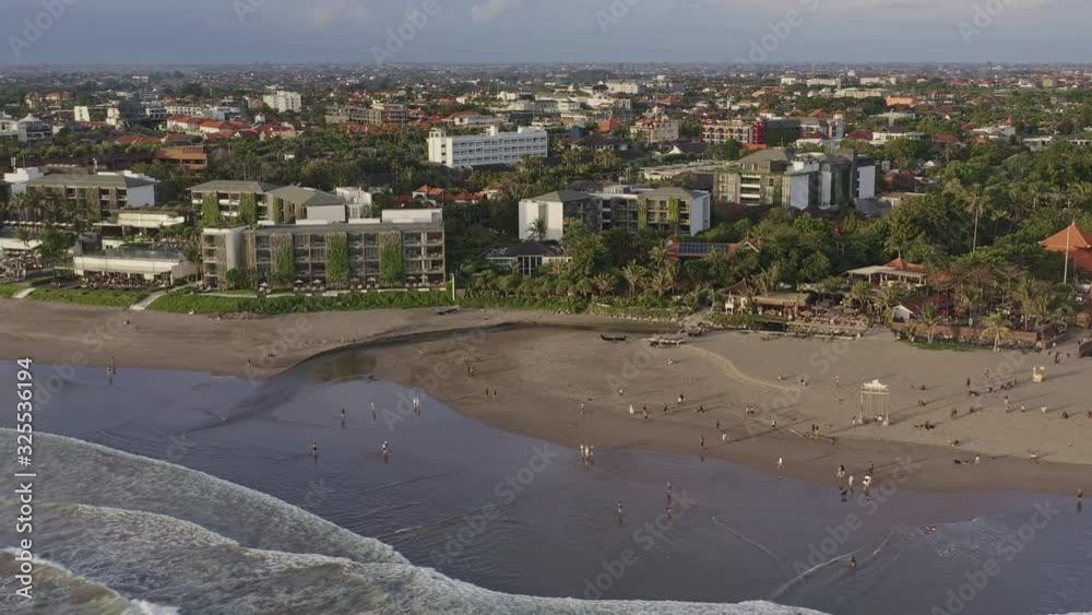Bali Indonesia Aerial v5 Panning view moving down shoreline and looking at beach clubs - April 2019