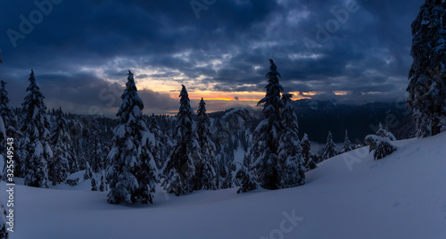 Canadian Nature Landscape covered in fresh white Snow during colorful and vibrant winter sunset. Taken in Seymour Mountain, North Vancouver, British Columbia, Canada. Panorama © edb3_16