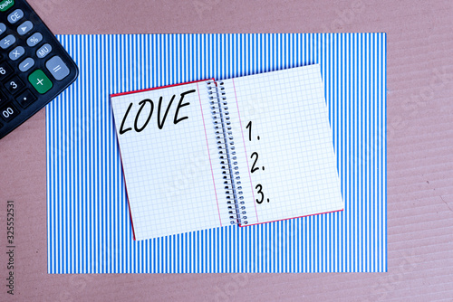 Writing note showing Love. Business concept for feeling of strong or constant affection for a demonstrating Feel deep roanalysistic Striped paperboard notebook cardboard office study supplies chart photo